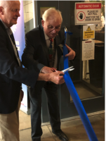 Richmond Rotary President David Stewart (right) opening the Charity Art Exhibition at The Station, Richmond, watched by organiser Richard Gibson. 